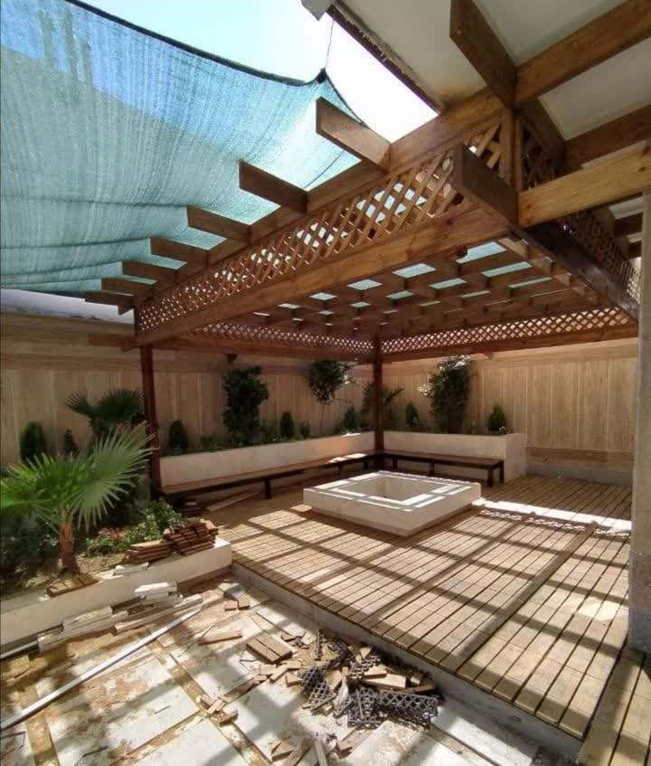 ساخت و طراحی کلبه سوئیسی و پرگولا چوبی هنر چوب هیمه در اصفهان