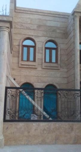 سنگ کاری و نمای ساختمان زارعی در مشهد