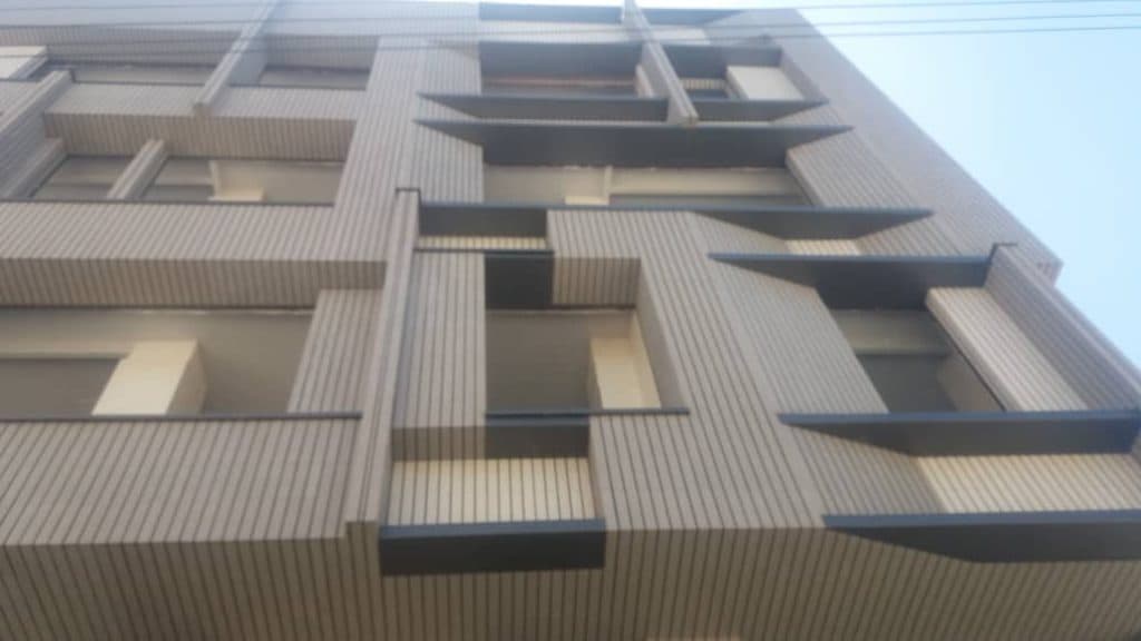 اجرای نما آجر و رومی ساختمان طلایی در همدان