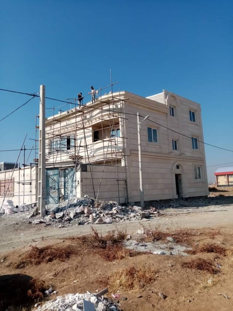 اجرای نما آجر و رومی ساختمان طلایی در همدان