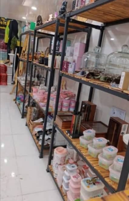تولید و پخش قفسه و رگال سام در علی آباد تهران