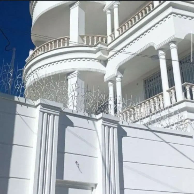 اجرای صفرتاصد نمای رومی ساختمان حسن موسی زاده در لاهیجان