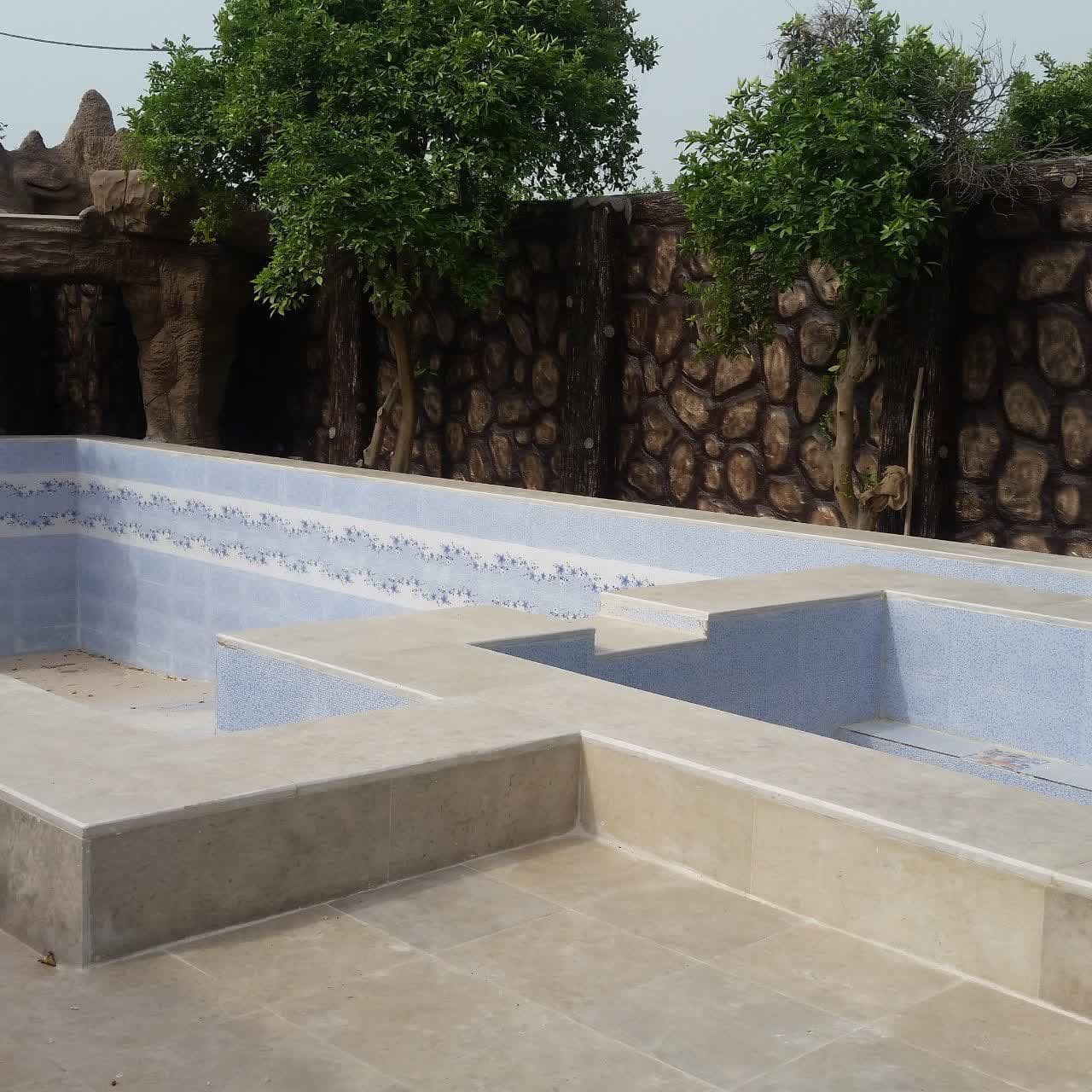 طراحی و ساخت آلاچیق و آبنمای صخره ای جهانگیری دزفول