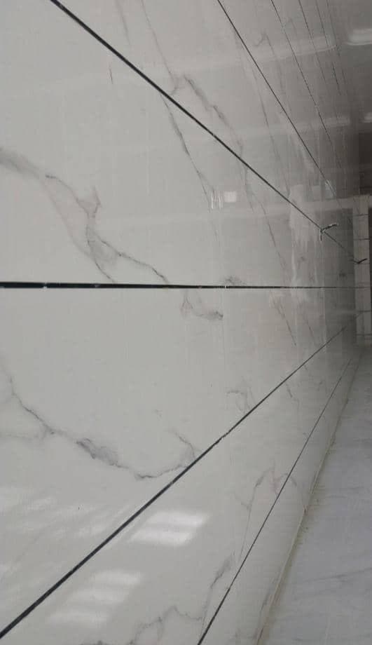 نصب و اجرای کاشی ساختمان اسماعیلی در ایلام