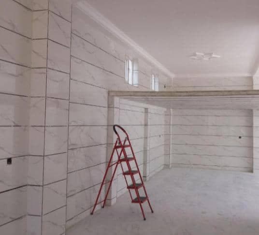 نصب و اجرای کاشی ساختمان اسماعیلی در ایلام
