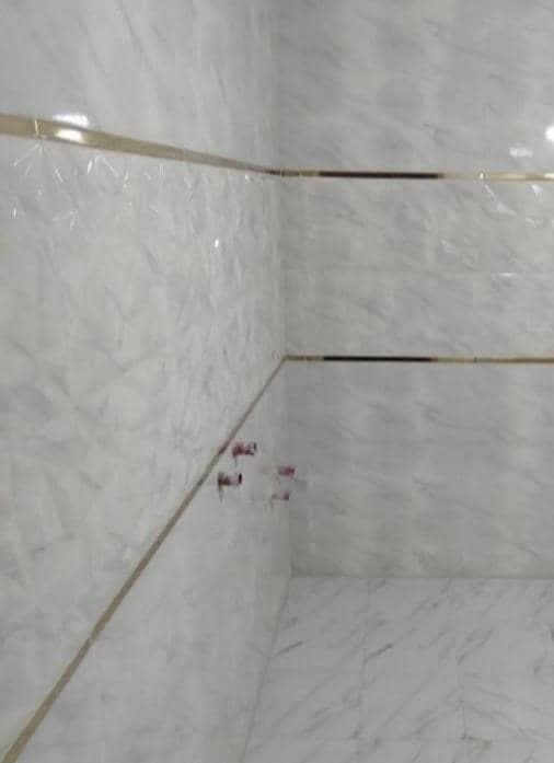 نصب و اجرای کاشی ساختمان اسماعیلی در ایلام