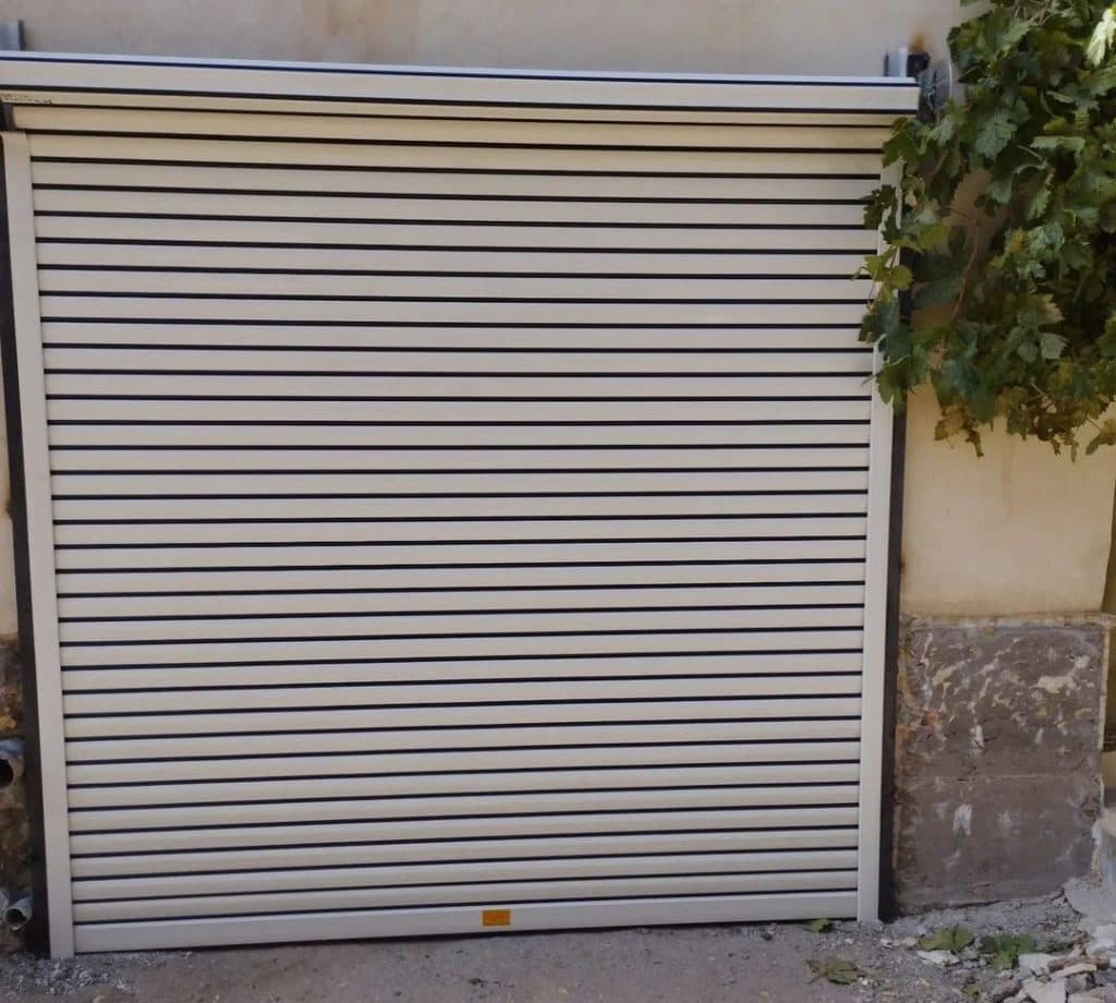 اجرا و نصب کرکره برقی و جک پارکینگی و شیشه سکوریت میراب در کاشان