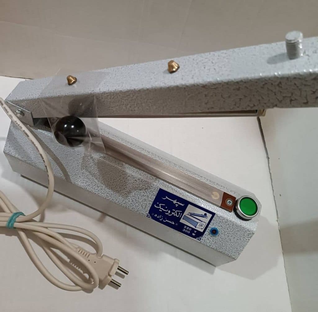 تولید دستگاه بسته بندی نایلون و سلفون سپهر الکترونیک حسن زاده در قم