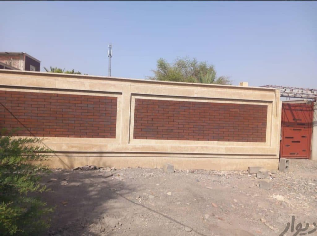 اجرای نمای ساختمان سنگ نسوز صید در جیرفت کرمان