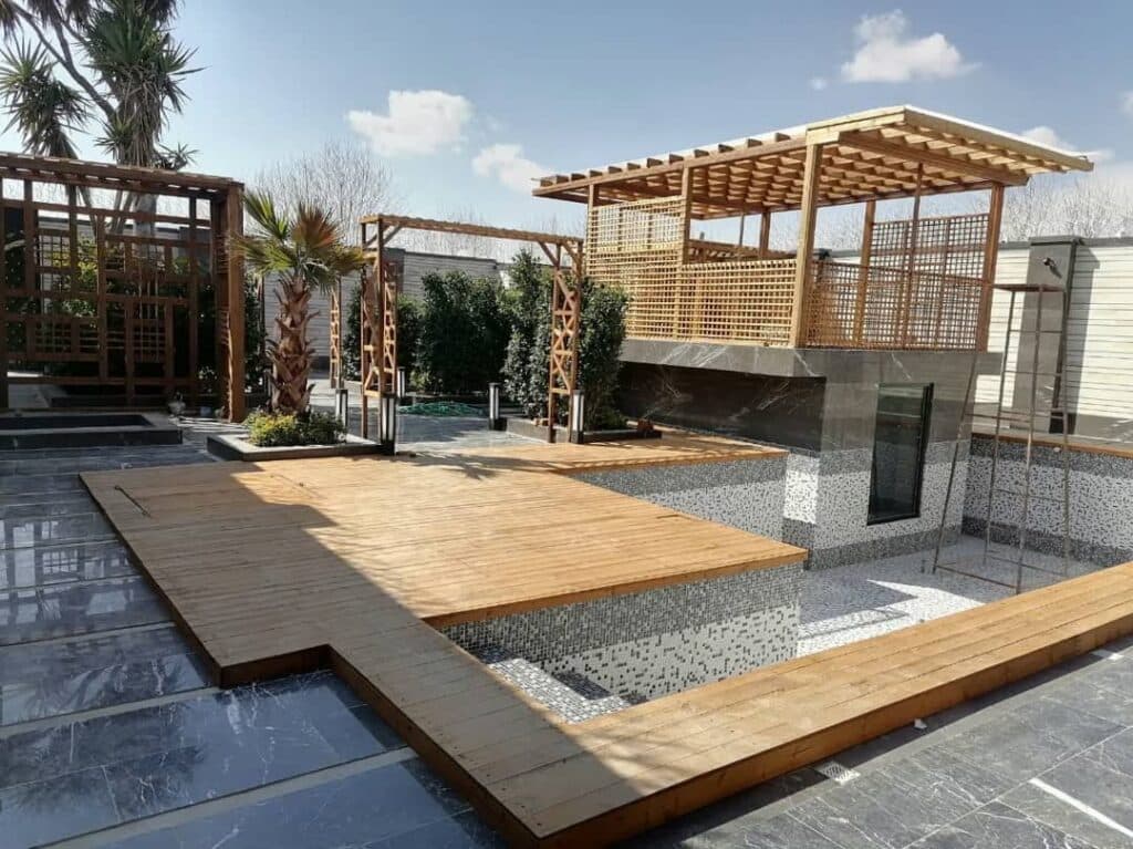 ساخت و طراحی کلبه سوئیسی و پرگولا چوبی هنر چوب هیمه در اصفهان