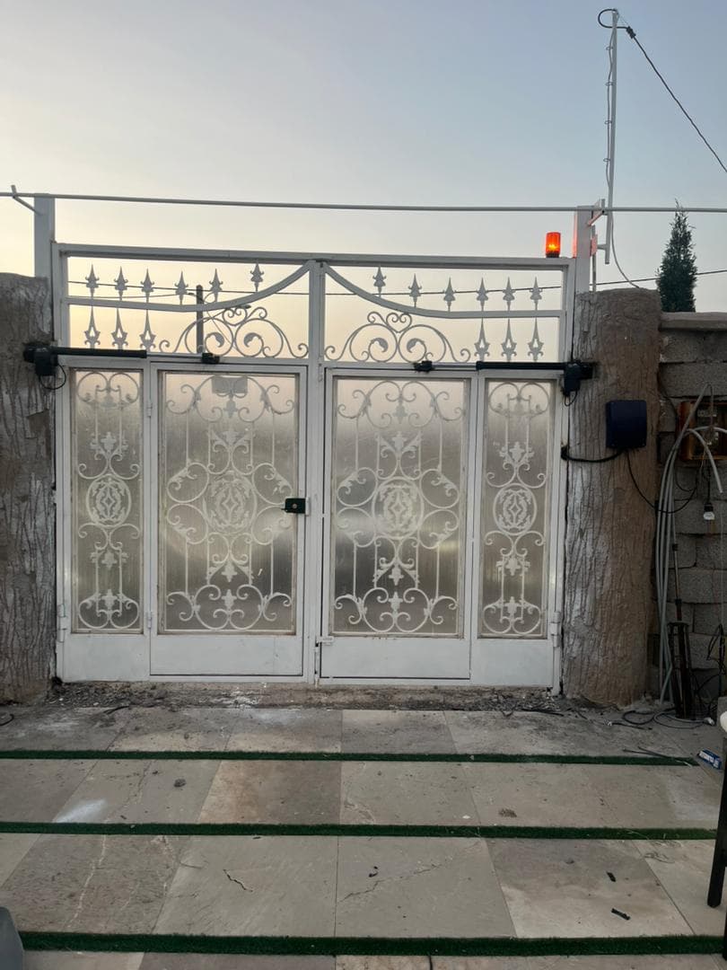 درب اتوماتیک و شیشه سکوریت بنی اسدی در سیرجان