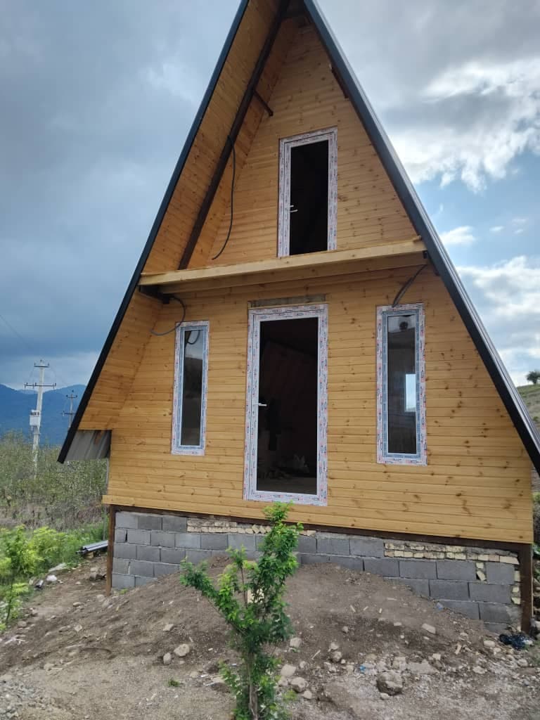 طراحی و اجرا کلبه سوئیسی و چوبی محمدی در ساری