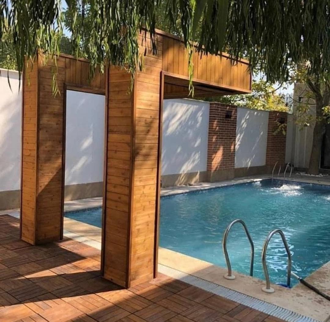 تهیه و اجرای چوب ترموود و روفگاردن آفیس نمای امید در تهران