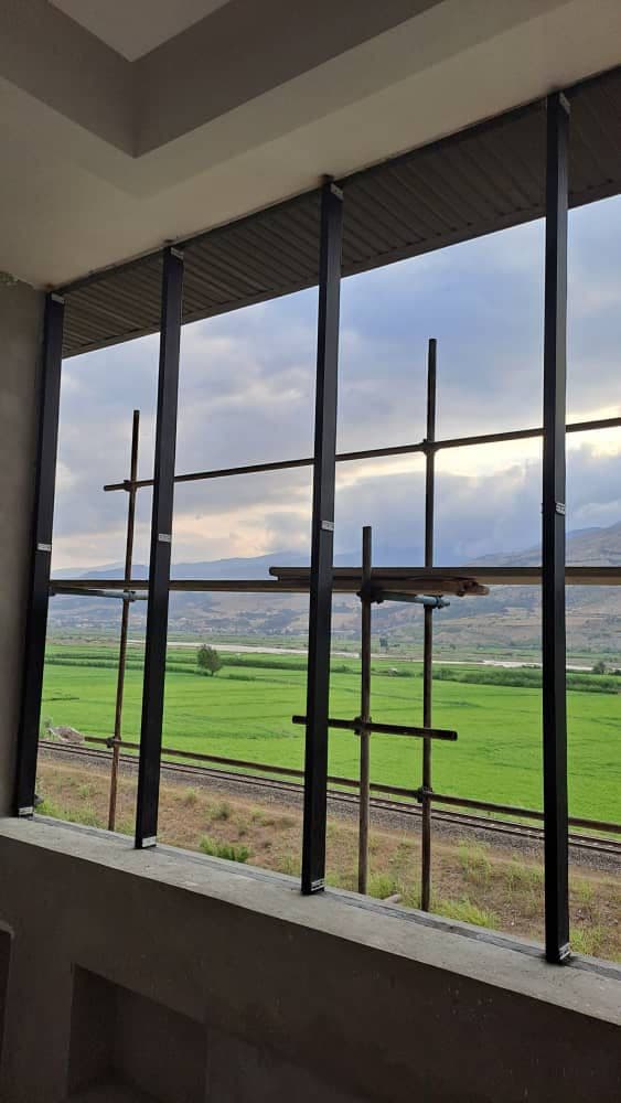 تولید و اجرا نمای شیشه ای کرتین وال سلیمانی در رستم آباد