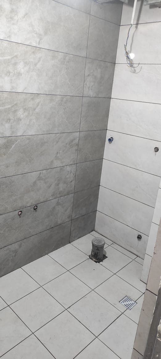 اجرای سنگ و سرامیک ساختمان کاسیت در کرمانشاه