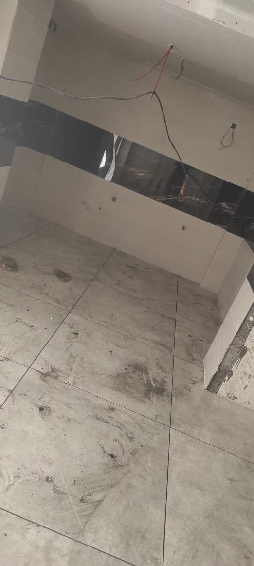 اجرای سنگ و سرامیک ساختمان کاسیت در کرمانشاه