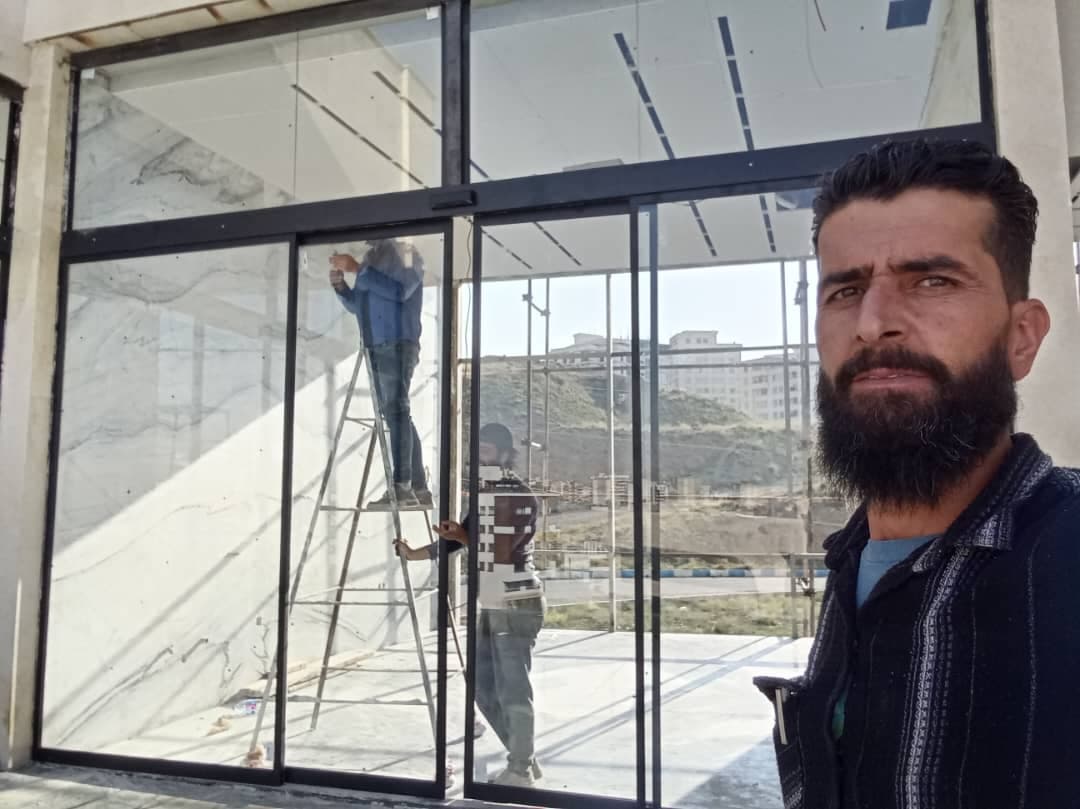 نصب و تعمیر شیشه سکوریت و جک پارکینگ آریا درب طاهری در پردیس