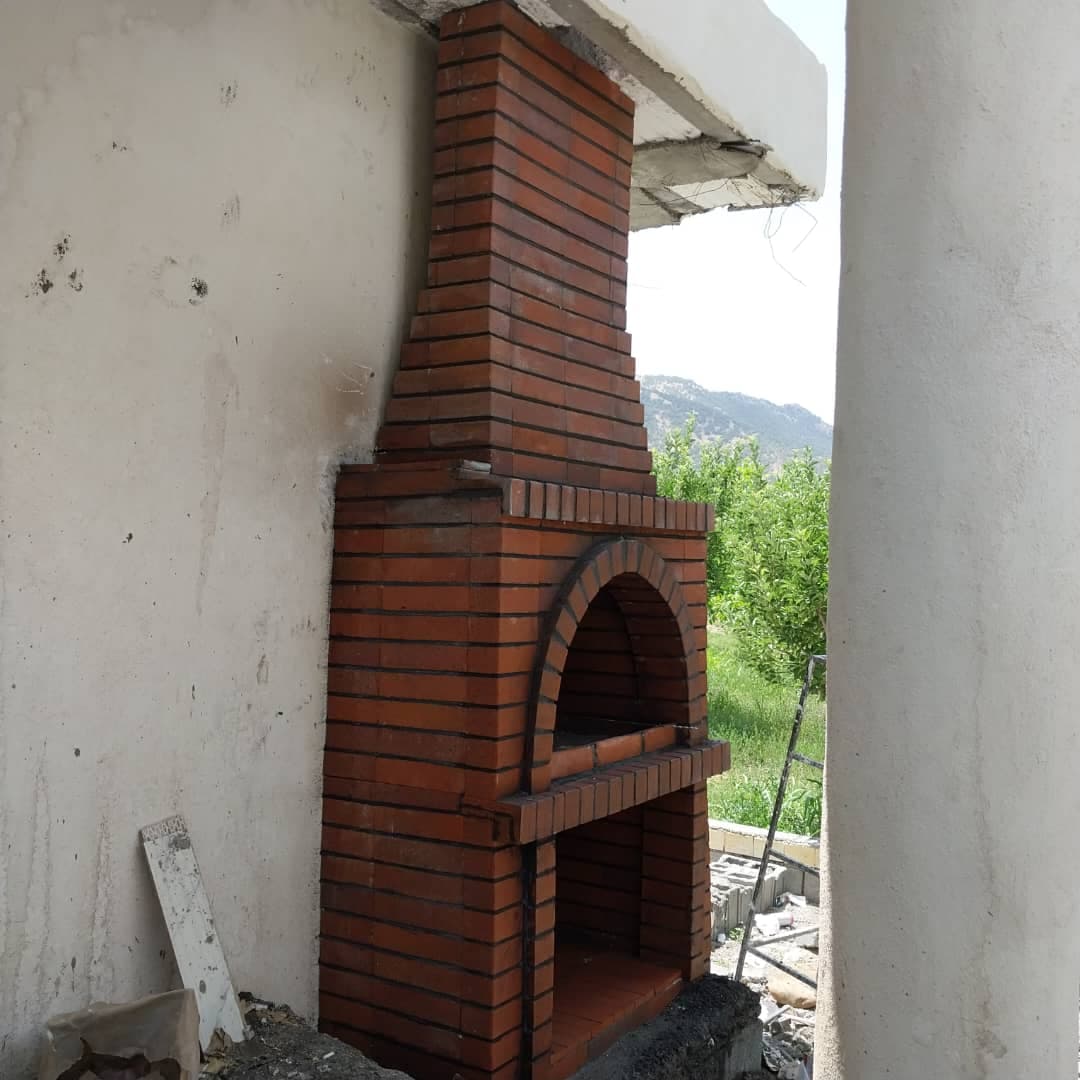 اجرای محوطه سازی شومینه و کاهگل صنعتی مطهری در یاسوج