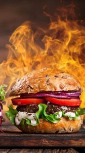 مخترع همبرگر تاریخچه پخت اولین همبرگر جهان