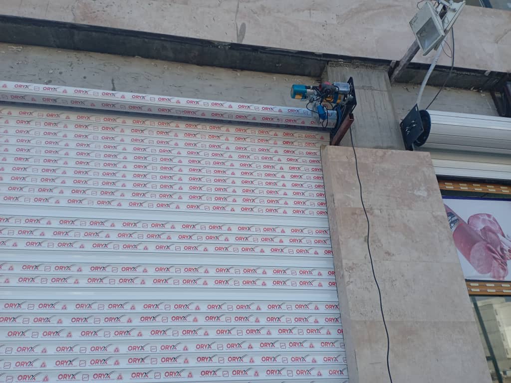 نصب و تعمیر شیشه سکوریت و جک پارکینگ آریا درب طاهری در گیلاوند دماوند