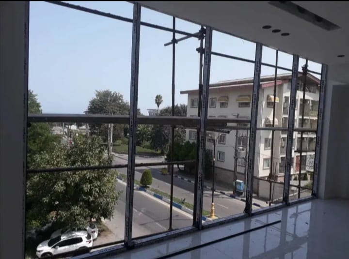 نصب و تعمیر شیشه سکوریت و جک پارکینگ آریا درب طاهری در پردیس