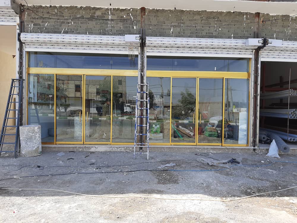 نصب و تعمیر شیشه سکوریت و جک پارکینگ آریا درب طاهری در پردیس