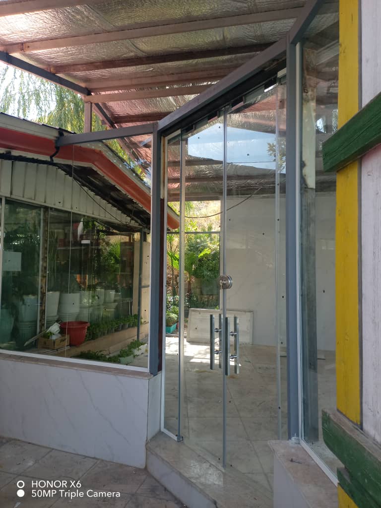 نصب و تعمیر شیشه سکوریت و جک پارکینگ آریا درب طاهری در پردیس