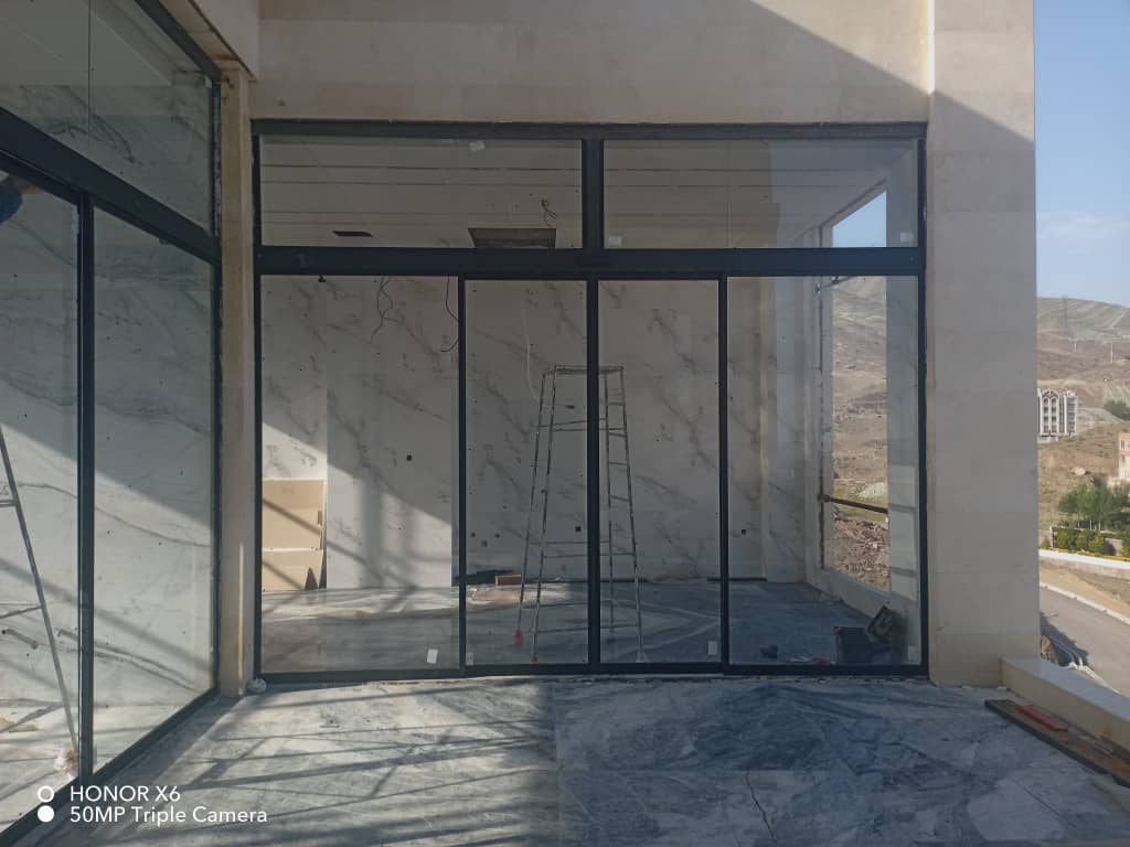 نصب و تعمیر شیشه سکوریت و جک پارکینگ آریا درب طاهری در پردیس